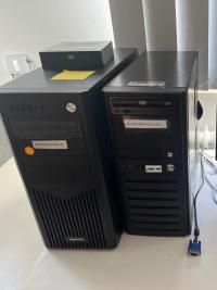 Two used Sun Blade 1500 Workstations in black Chieftec tower cases, labeled Reference Computer 1 and 2, shown with included keyboard and mouse.