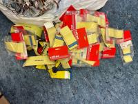 Bulk collection of Roline IDE ATA133 80-core flat ribbon cables in red retail packaging and loose yellow 'IDE cable HDD' labeled units.