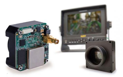 Kaya Instruments Iron SDI Ruggedized-Kamera mit Display und offener Rückseite zur Darstellung elektronischer Komponenten.