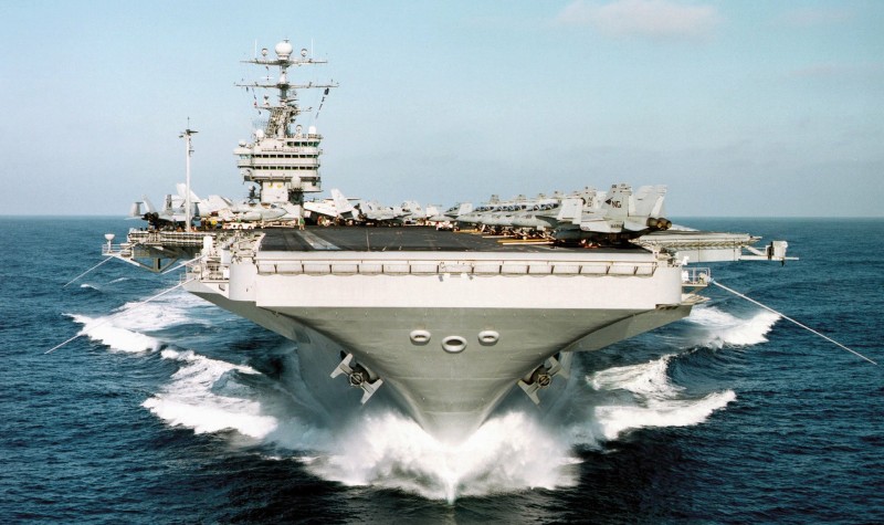 Military and Defense: an aircraft carrier is a warship that serves as a seagoing airbase.